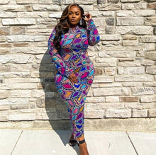 Load image into Gallery viewer, Slip into this super sexy dress for your next night out with the girls or date night! This dress hugs your body in all the right places. This sexy snake print long bodycon dress is versatile you can wear the zipper in the front or back. Style this dress with a black high heel and clutch for a complete look. 
