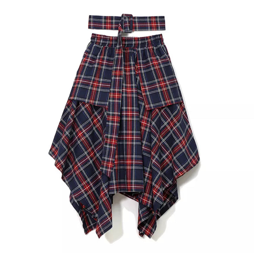 Our Don't Talk Back Plaid Skirt flattering retro-inspired and luxurious statement piece that you'll turn to again and again. Featuring an asymmetrical design, a belt, two front pockets and elastic waistband; you need this in your closet! Pair with a stylish crop top, high heel and statement bag for a complete look. 