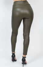 Load image into Gallery viewer, Obsessed is an understatement when it comes to these Faux leather leggings. This is surely a piece for your closet! Material that allows great stretch this pant sculpts your body in all the right places. These trendy pants are skinny fit and elasticized waistband. Pair with a statement knitted top and high heels to give your look an edgy but stylish finish to complete your look. 
