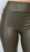 Load image into Gallery viewer, Obsessed is an understatement when it comes to these Faux leather leggings. This is surely a piece for your closet! Material that allows great stretch this pant sculpts your body in all the right places. These trendy pants are skinny fit and elasticized waistband. Pair with a statement knitted top and high heels to give your look an edgy but stylish finish to complete your look. 
