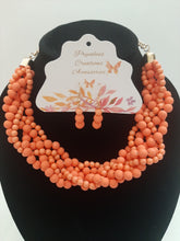 Load image into Gallery viewer, Gorgeous multi strand bubble necklace is fun and peachy. Features seven strands of pop color beads with a pair of earrings. Not only will it give you the party look you desire, but also make it simple outfit look flawless.
