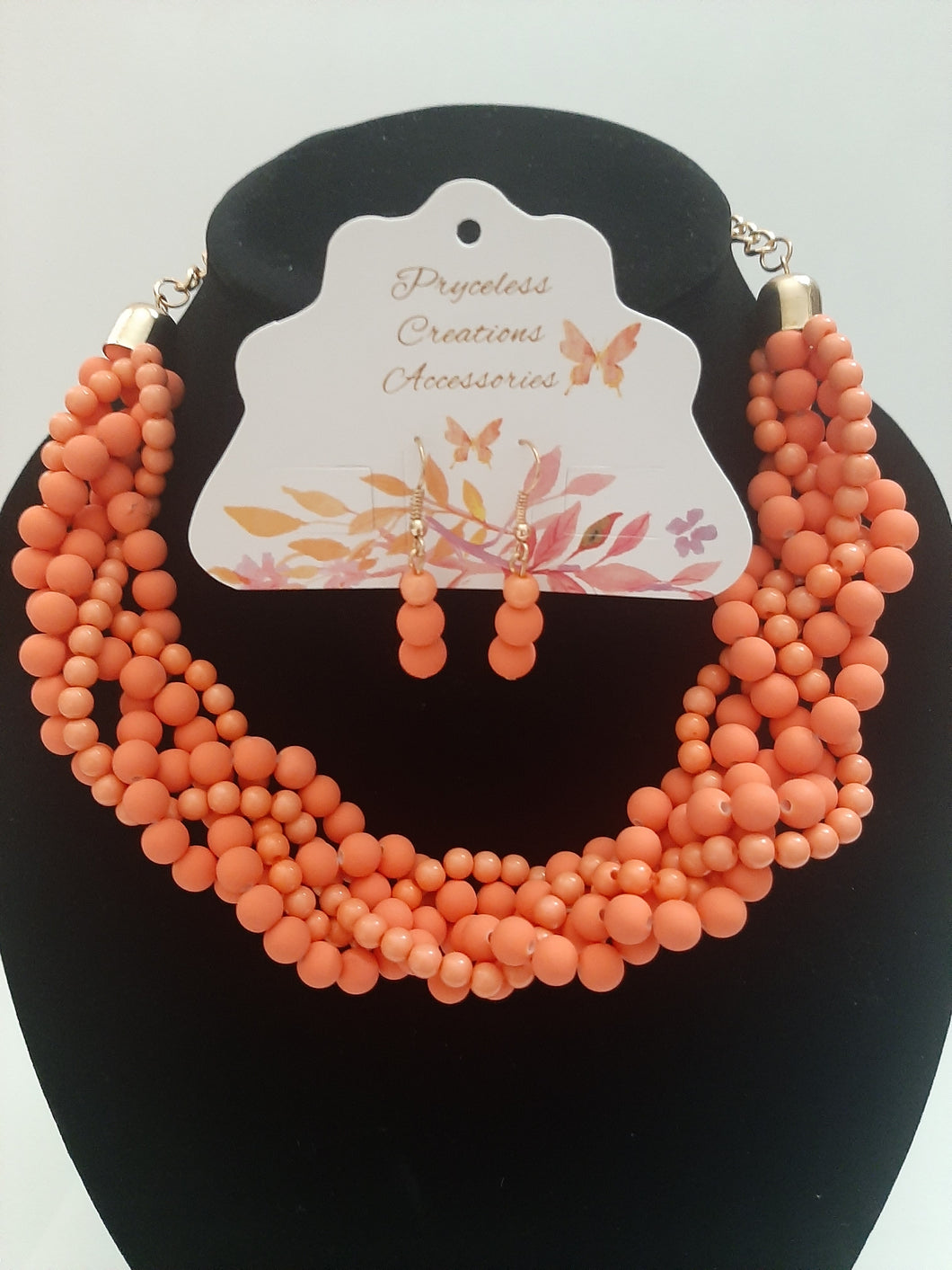 Gorgeous multi strand bubble necklace is fun and peachy. Features seven strands of pop color beads with a pair of earrings. Not only will it give you the party look you desire, but also make it simple outfit look flawless.
