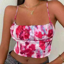 Load image into Gallery viewer, This satin tie die festival top is sure to take your weekend look that extra mile. Featuring a pink, white and baby blue material with a backless design and thin strap detailing, cowl neckline and a cropped length. Style with blue jeans and high heels for a date night with the bae.
