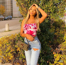 Load image into Gallery viewer, This satin tie die festival top is sure to take your weekend look that extra mile. Featuring a pink, white and baby blue material with a backless design and thin strap detailing, cowl neckline and a cropped length. Style with blue jeans and high heels for a date night with the bae.
