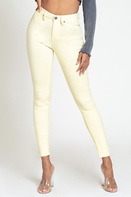 If you don't have this closet essential, you are missing out! These high rise, yellow, skinny jeans are made of super stretchy material and making them the jeans that every girl needs. They feature two back pockets and a front zipper and button to close. These are the pants that you can wear to work, dinner, or the club. Pair with heels and a great top to create the perfect outfit.