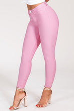 Load image into Gallery viewer, If you don&#39;t have this closet essential, you are missing out! These high rise, Barbie pink, skinny jeans are made of super stretchy material and making them the jeans that every girl needs. They feature two back pockets and a front zipper and button to close. These are the pants that you can wear to work, dinner, or the club. Pair with heels and a great top to create the perfect outfit.
