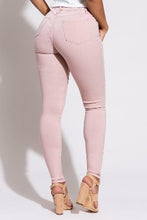 Load image into Gallery viewer, If you don&#39;t have this closet essential, you are missing out! These high rise, rose pink, skinny jeans are made of super stretchy material and making them the jeans that every girl needs. They feature two back pockets and a front zipper and button to close. These are the pants that you can wear to work, dinner, or the club. Pair with heels and a great top to create the perfect outfit.

