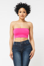 Load image into Gallery viewer, This tube top is everything that you need switch up your wardrobe with our Sweet As Candy Tube Top. Featuring a vibrant fuchsia soft cotton blend material with a bandeau neckline and a cropped length, we are obsessed. Wear this with high waist pants and high heels or sandals for the ultimate cute or casual look that you will absolutely love.
