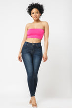 Load image into Gallery viewer, This tube top is everything that you need switch up your wardrobe with our Sweet As Candy Tube Top. Featuring a vibrant fuchsia soft cotton blend material with a bandeau neckline and a cropped length, we are obsessed. Wear this with high waist pants and high heels or sandals for the ultimate cute or casual look that you will absolutely love.
