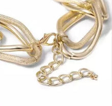 Load image into Gallery viewer, Golden Chain Choker Necklace   Make a bold accessory statement with this thick gold chain necklace. This necklace featuring a thick chain detail and clasp closure. Dress it up or down, our jewelry collection is filled with pieces that add instant polish.

