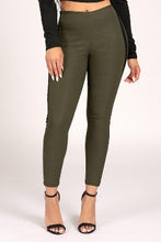 Load image into Gallery viewer, Upgrade your casual look this season with these olive high waisted pants. Made of materials that allows great stretch and flexibility. These leggings come in a soft material featuring an elasticated waist band and black twill side seam design. Style with a simple bodysuit and heels to complete the look.
