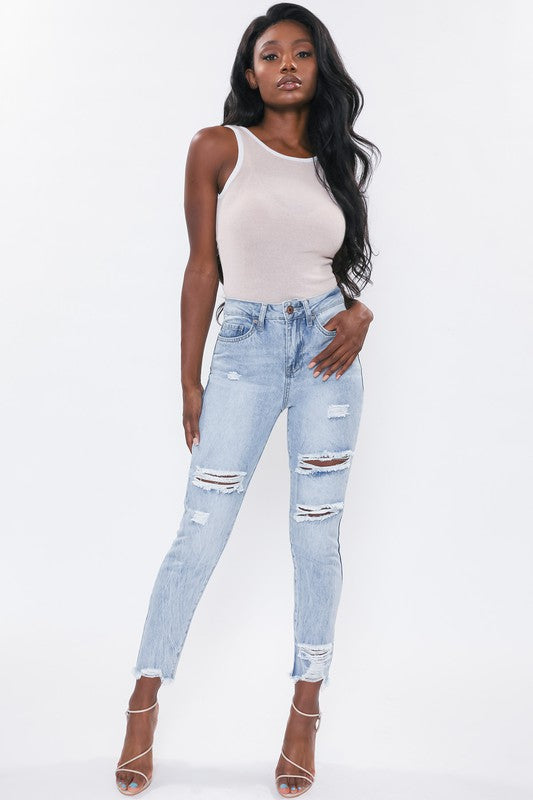 If you don't have this closet essential, you are missing out! These high rise, distressed denim medium wash, skinny jeans are a must have! They feature two back, two front pockets and a front zipper and button to close, distressed details to have you styling at the top of your game. We love pairing our denim distressed jeans with heels for a classier look or with some booties to bring some edge!