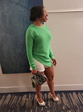 Load image into Gallery viewer, This Summer sweater is made with love for nice sunny days! This is statement-making sweater crafted from airy open knit in a beauty Kelly green knit soft fabric. This long sleeve sweater featuring an asymmetrical detailing hem give it an edge, you will be able to wear this sweater and turn heads throughout. Pair with light wash denim jeans shorts, heels, accessories, and statement bag and you&#39;ll be ready to get your day or night started!
