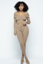 Load image into Gallery viewer, This Just Chill Set is every wardrobe essential. Featuring a nude rib kitted fabric with a V neckline top with long sleeves, high rise pants with soft elasticized waistband, lightweight material. Style with a high heel or boots and handbag for a weekend look you&#39;ll love! 
