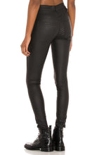 Load image into Gallery viewer, Flex your style in these cute Lex Skinny Wax Coated Denim Black Jeans the liquid wax coating design gives these jeans a chic look. Perfect for styling any and every way you want! These jeans come in a high rise fit featuring 5 pocket, zip and button closure. You can pair these with our black crop tank top, and chic fashion blazer or a graphic tee and high heels or combat boots and of course a handbag for a complete look!
