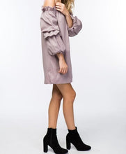 Load image into Gallery viewer, Cute Lunch date Lilac Lily Dress - Lilac Did it just get hot in here with this super flirty lilac dress! Playful and casual; this is a must-have for your closet! Featuring a luxurious off the shoulder style, puff sleeves, ruched tiered detailing on sleeves. Pair with a high heel and mini bag for a look
