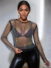 Load image into Gallery viewer, Can you feel the love tonight in this season with this flirty  top is made from a rhinestone netting fabrication, long sleeve and is complete with a crew neckline. This top will make any outfit special. Style this mesh rhinestone crop over your favorite bralette top and a pair of high waisted leather pants for a sexy glam date night look!
