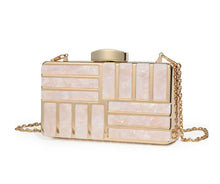Load image into Gallery viewer, This marble acrylic clutch is elegant, glamorous and fashionable. A stylish and convenient addition to your accessory collection. With room for all your must-have gizmos, this rectangular purse has a removable crossbody strap and gold hardware.  Great present for your friend, your family or yourself. This unique &amp; beautiful design will make you shine.
