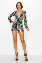 Load image into Gallery viewer, Elevate your wardrobe with this bold sexy romper. Featuring a trendy swirl print with adjustable belt, we are obsessed. Pair with heels and accessories for a look that is sure to make a statement this season.
