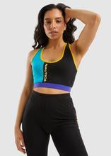 Load image into Gallery viewer, Nautica Viola Bra Top - Black This statement bra top is the perfect addition to your Spring, Summer wardrobe. With bright block colors and contrasting branding you can be sure to chill in style. 
