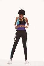 Load image into Gallery viewer, Nautica Zeller Leggings - Black  Introduce true comfort into your Nautica activewear wardrobe a fresh color block design has been added for a pop of color and a high waisted fit for an extra relaxed feel. You can pair it with the Nautica viola bra top for the complete look, you can be sure to chill in style. 
