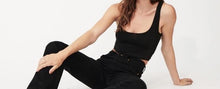 Load image into Gallery viewer, Add just the right touch of edge to your look with this sexy knitted cami crop top. Featuring a round neckline, our thick tank straps and a cropped fit. Pair with our faux leather leggings or our &quot;Hybrid Dream Jeans&quot;, high heels and statement handbag for a complete look we&#39;re loving.
