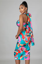 Load image into Gallery viewer, This sexy Picasso skirt set is everything and a definite must have for your wardrobe babe. Easy to style and has plenty stretch! This super cute skirt set comes in a mid length featuring a ruched detail, elastic waistband and matching cross wrap top. Pair with a statement high heels and handbag for a complete look. 
