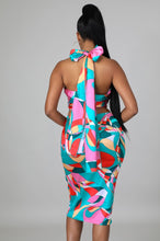 Load image into Gallery viewer, This sexy Picasso skirt set is everything and a definite must have for your wardrobe babe. Easy to style and has plenty stretch! This super cute skirt set comes in a mid length featuring a ruched detail, elastic waistband and matching cross wrap top. Pair with a statement high heels and handbag for a complete look. 
