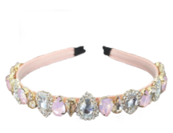 The pink bling crystal headband is beautiful and elegant. Multicolor rhinestones. Wear with a luxurious white dress or your favorite jeans and crop top. It always looks perfect. Is extremely comfortable and this headband makes a glamorous statement piece.