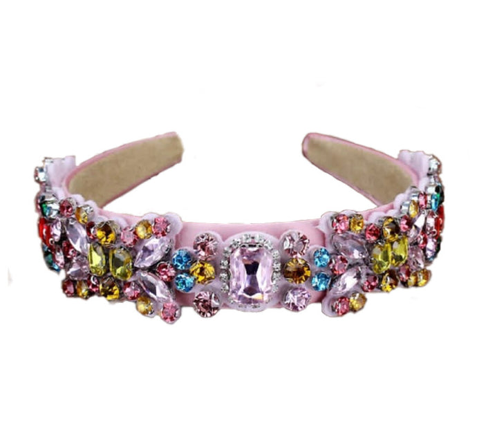 The pink crystal headband is beautiful and elegant. Multicolor rhinestones. Wear with a luxurious white dress or your favorite jeans and crop top. It always looks perfect. Is extremely comfortable and this headband makes a glamorous statement piece.