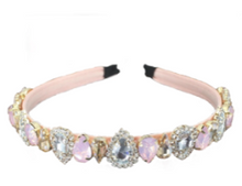 Load image into Gallery viewer, The pink bling crystal headband is beautiful and elegant. Multicolor rhinestones. Wear with a luxurious white dress or your favorite jeans and crop top. It always looks perfect. Is extremely comfortable and this headband makes a glamorous statement piece.
