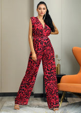 Load image into Gallery viewer, You know you need to add this sassy leopard print jumpsuit into your closet babe! This short sleeve leopard jumpsuit features a deep V-neck, high waist, open back V- cut out design. Rock this sexy jumpsuit with black high heels and a clutch and you&#39;ll be slayin&#39; like a diva all night long.

