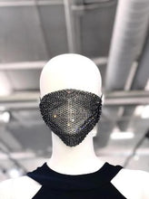 Load image into Gallery viewer, Redefine your face covering with a touch of sparkle. The studded design makes the mask decoration more creative, and more shiny and charming. Get ready to party no matter where you are in this sexy face mask featuring an all over sheer mesh to reveal just a peek of your face, all over delicate rhinestone accents, and elastic ear loops for sitting comfortably on your face. Option to layer a solid mask underneath (not included) for a full coverage look.

