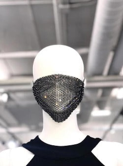 Redefine your face covering with a touch of sparkle. The studded design makes the mask decoration more creative, and more shiny and charming. Get ready to party no matter where you are in this sexy face mask featuring an all over sheer mesh to reveal just a peek of your face, all over delicate rhinestone accents, and elastic ear loops for sitting comfortably on your face. Option to layer a solid mask underneath (not included) for a full coverage look.