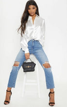 Load image into Gallery viewer, A timeless classic blouse made from the finest silk. Featuring a luxe black satin fabric, a loose fit and button up front - this shirt can be styled up or down whatever the occasion. Team it with some high waist pants and strappy heels for a must have look.
