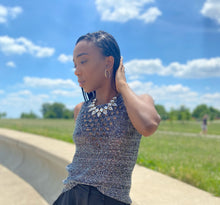 Load image into Gallery viewer, Feel cute and cozy, with this Shine Bright knitted camisole sweater will get the job done. Featuring a soft and stretchy sequin knitted fabric and sleeveless. Style with our &quot;Swing It Baby Shorts&quot; or jeans and high heels for a complete look.

