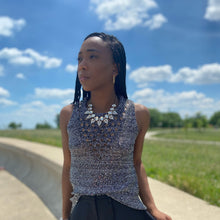 Load image into Gallery viewer, Feel cute and cozy, with this Shine Bright knitted camisole sweater will get the job done. Featuring a soft and stretchy sequin knitted fabric and sleeveless. Style with our &quot;Swing It Baby Shorts&quot; or jeans and high heels for a complete look.
