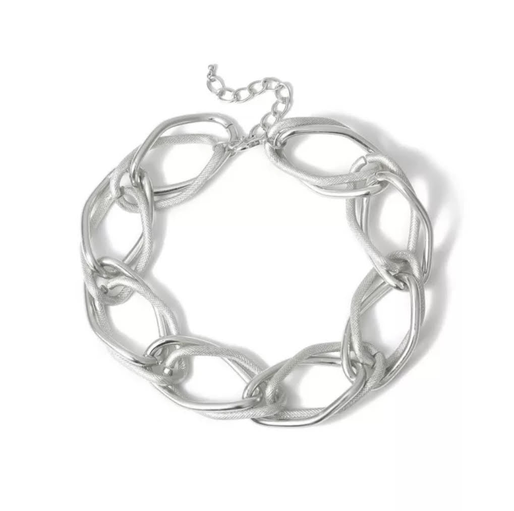 Make a bold accessory statement with this thick silver chain necklace. This necklace featuring a thick chain detail and clasp closure. Dress it up or down, our jewelry collection is filled with pieces that add instant polish.