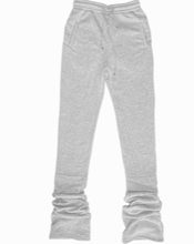 Load image into Gallery viewer, High Waisted Stacked Sweatpants - Heather Grey  Upgrade your casual look this season with these stacked sweatpants. These sweatpants come different colors. Featuring elastic waist band and two deep side pockets, drawstring for a comfortable stretch. You can style with a simple bodysuit or T- Shirt to complete the look.
