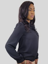 Load image into Gallery viewer, Girl we are lovin&#39; this blouse top, featuring a white soft material, with a tie up riffle collar. Team this with matching satin trousers and killer heels for that last minute night out outfit. 
