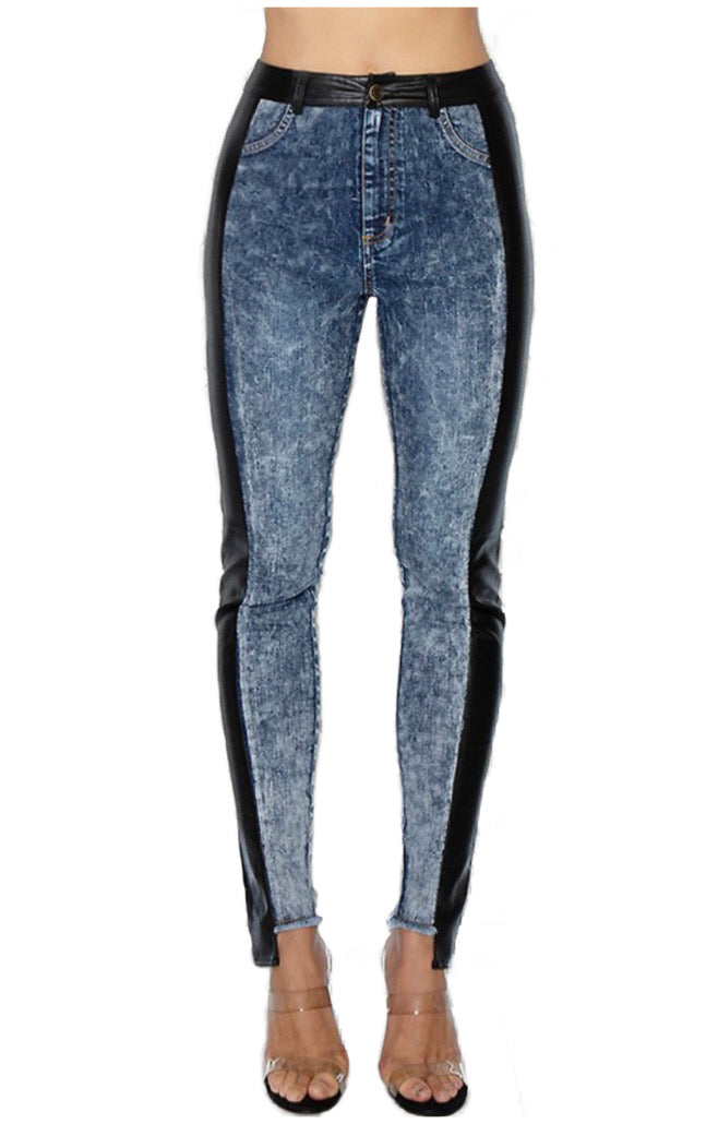 Jeans are a must, add some edge to your look in these vegan leather denim pants. Great for dressing up and down! These jeans come in a high-rise fit featuring a mid wash denim material and vegan leather side detail. Make a statement with a super stylish top and high heels for a look we love! 
