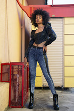 Load image into Gallery viewer, Jeans are a must, add some edge to your look in these vegan leather denim pants. Great for dressing up and down! These jeans come in a high-rise fit featuring a mid wash denim material and vegan leather side detail. Make a statement with our angelic vegan leather puff sleeve crop top super stylish top and high heels for a look we love! 
