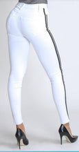 Load image into Gallery viewer, Flex your style in these cute white skinny Jeans with a contrast black stripe designs. Perfect for styling any and every way you want! These jeans come in a high rise fit featuring a raw uneven hem ends, zip and button closure. Pair with a graphic tee or chic fashion top, high heels or combat boots and of course a handbag for a complete look!
