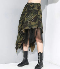 Load image into Gallery viewer, Get noticed for all the right reasons with our Work Your Angles Camo Asymmetrical Distressed Skirt. This unique skirt features a wide elastic waistband, camouflage print patterning and mesh. Pair with your favorite sexy bodysuit and stiletto heels.
