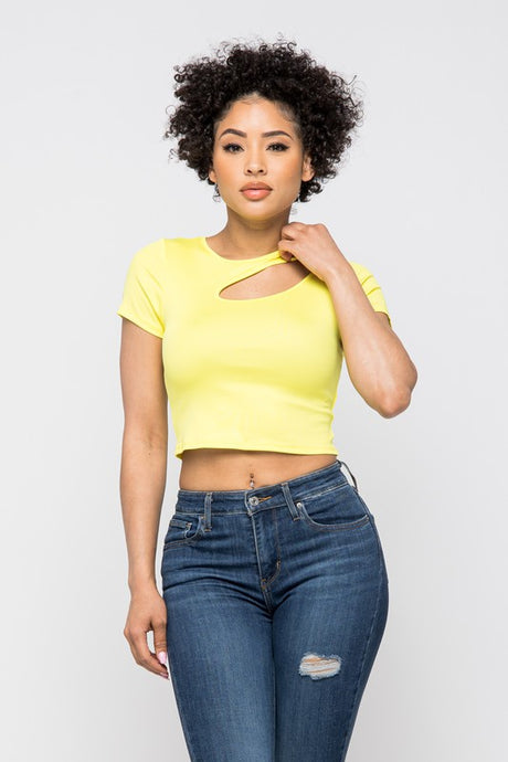 Crop tops are essential in every girls wardrobe and we're obsessing over our vibrant yellow crop top. Featuring a stretch kitted material with short sleeves and a round neckline, and a cut-out detailing which exposes the skin for a real statement-making look. Pair with your favorite blue wash denim jeans or with cargos and high heels to complete the look