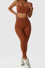 Load image into Gallery viewer, Get ready to show off your confident side with these leggings. Featuring a rust color material with an amazing breathable elastic waistband that feels like skin and a high waisted fit. Team with the matching top, a trench coat and chunky kicks for the perfect off-duty look.
