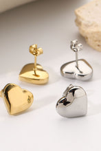Load image into Gallery viewer, Complete your look with these stylish silver and gold stud earrings. Pryceless Creations Clothing classic heart studs adds a bit of extra elegance to these stud earrings that we love! 
