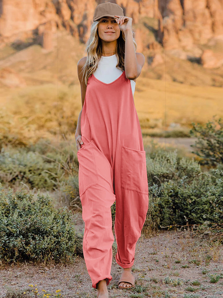 This Sunrise romper features a striking V- neckline, pockets and lots of stretch for added comfort, this full-size sleeveless jumpsuit comes in a variety of colors. Our Sunrise jumpsuit is stylish, comfortable and its lightweight fabric makes it ideal for summer or fall events, such as brunch or a family BBQ. Style with a bag and your favorite sandals for a complete look.