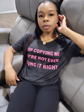Load image into Gallery viewer, Make this cute graphic T apart your wardrobe because you&#39;re the trendsetter babe! This top adds the perfect touch to any outfit you want to make not-so-simple. Featuring a crew neck, short sleeves, and soft fabric. Style with a pair of leggings and heels for a complete look.
