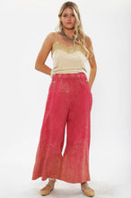 Load image into Gallery viewer, Bring back the 70&#39;s with these trendy acid wash French terry wide-leg pants that feature beautiful crystal-embedded buttons. Elastic waistband, Pair with a bodysuit, pumps, or favorite flats and a handbag for the perfect day look.
